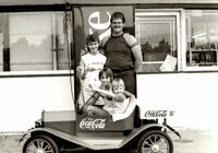 Guy and Sharon Wheatley with Donya Connelly and Brandon Wheatley. Won drawing at Neals grocery for Coke Car.