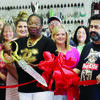 Glenda Jackson and husband Gabriel Rodriguez with Chamber of Commerce members 
at their recent ribbon cutting